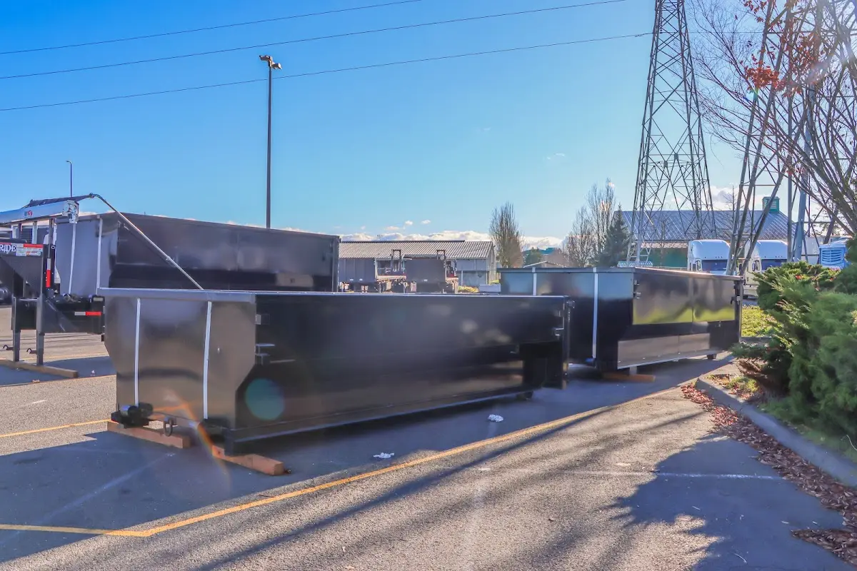 Roll-off dumpster ready for waste disposal at job site for Concrete Dumpster Rental in North Ridgeville